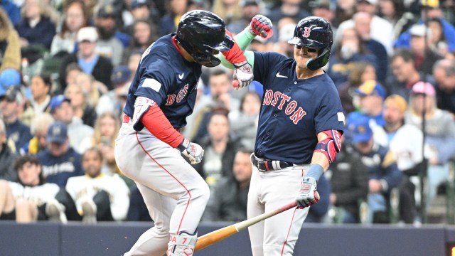 Boston Red Sox left fielder Masataka Yoshida, shortstop Enrique Hernandez