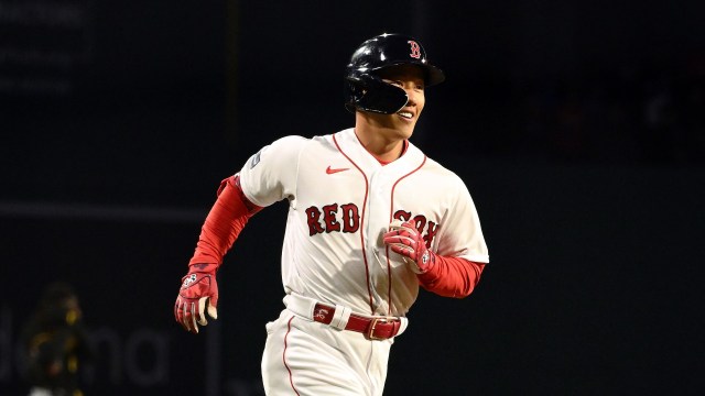 Masataka Yoshida of the Boston Red Sox walks back to the dugout