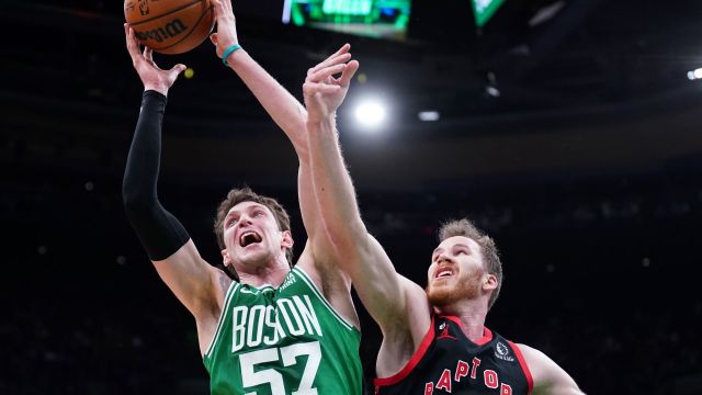 Boston Celtics forward Mike Muscala and Toronto Raptors center Jakob Poeltl