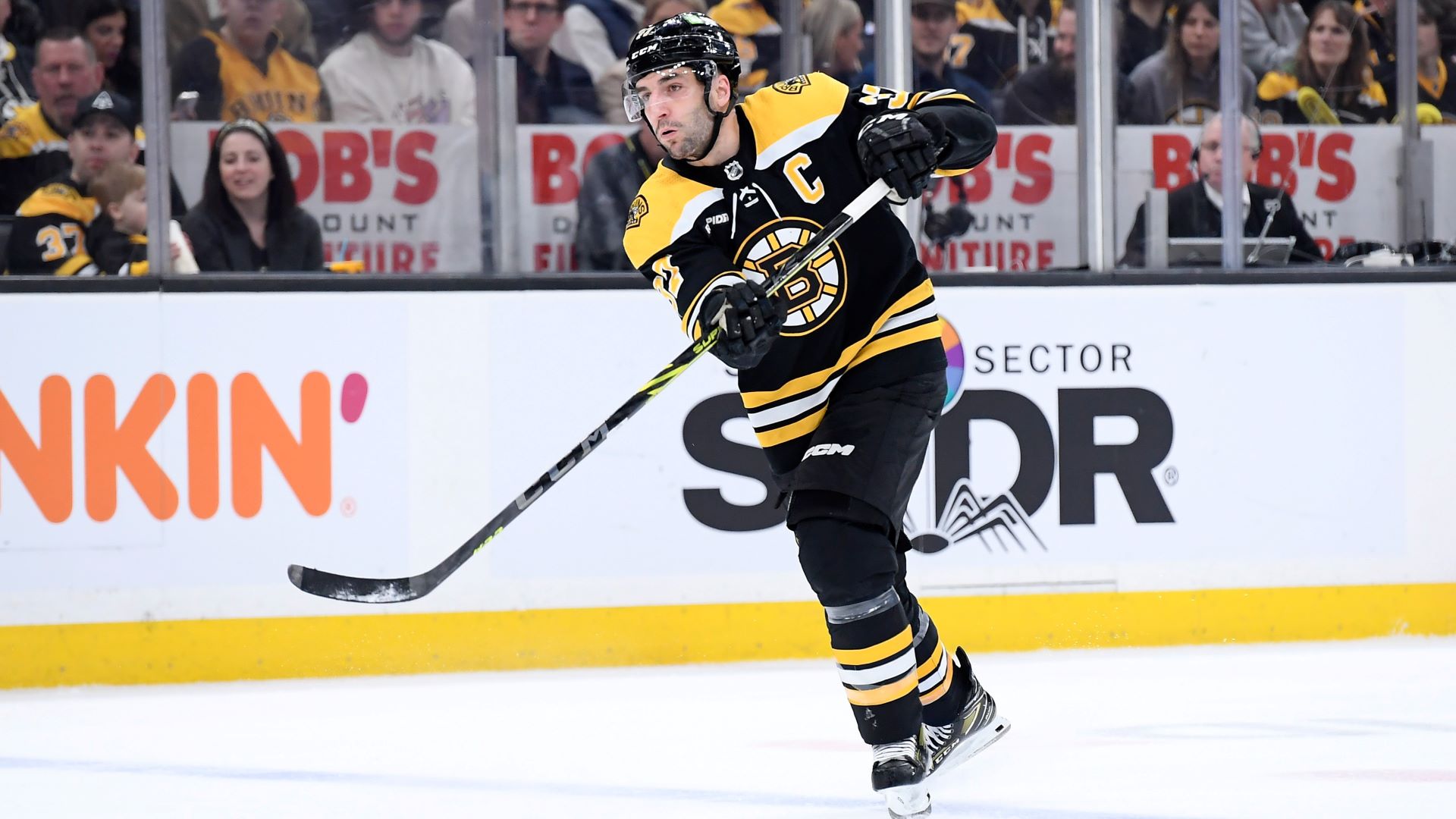 Boston Bruins - Patrice Bergeron walks down the street into Fenway