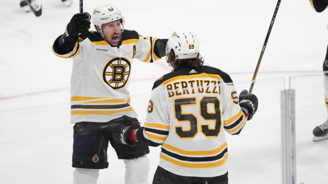 Boston Bruins forwards Brad Marchand, Tyler Bertuzzi