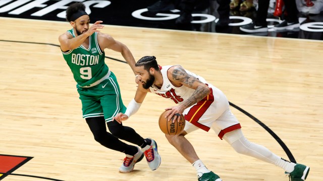 Boston Celtics guard Derrick White and Miami Heat forward Caleb Martin