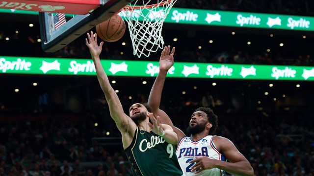 Boston Celtics guard Derrick White and Philadelphia 76ers center Joel Embiid