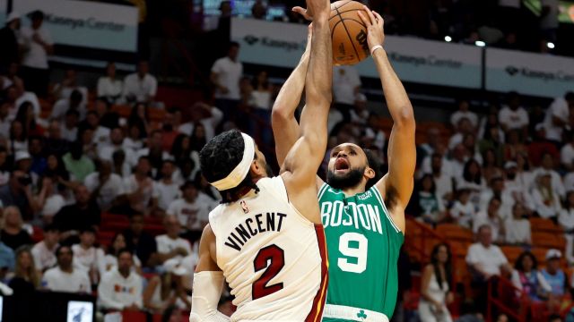 Miami Heat guard Gabe Vincent and Boston Celtics guard Derrick White