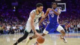 Boston Celtics Jayson Tatum and Philadelphia 76ers guard Tyrese Maxey
