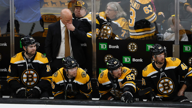 Boston Bruins head coach Jim Montgomery and his team