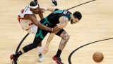 Miami Heat guard Jimmy Butler and Boston Celtics forward Jayson Tatum