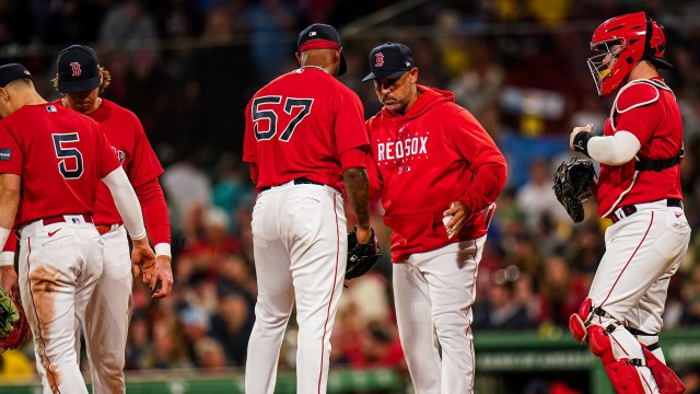 Boston Red Sox relief pitcher Joely Rodríguez and manager Alex Cora