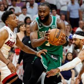 Miami Heat guards Kyle Lowry, Gabe Vincent, Boston Celtics forward Jaylen Brown