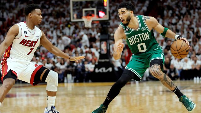 Miami Heat guard Kyle Lowry and Boston Celtics forward Jayson Tatum