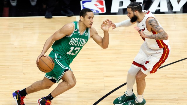 Boston Celtics guard Malcolm Brogdon and Miami Heat forward Caleb Martin