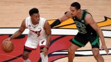 Boston Celtics guard Malcolm Brogdon and Miami Heat guard Kyle Lowry