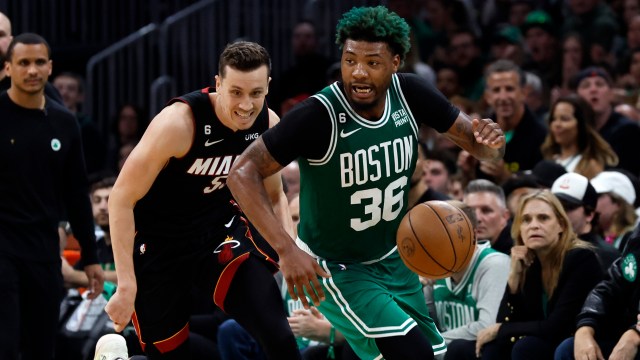 Boston Celtics guard Marcus Smart and Miami Heat forward Duncan Robinson