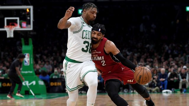 Boston Celtics guard Marcus Smart and Miami Heat guard Gabe Vincent
