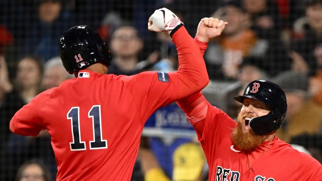 Boston Red Sox third baseman Rafael Devers and designated hitter Justin Turner