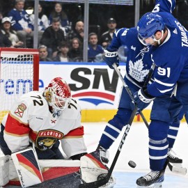 Florida Panthers goalie Sergei Bobrovsky, Toronto Maple Leafs forward John Tavares