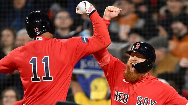 Boston Red Sox third baseman Rafael Devers and designated hitter Justin Turner