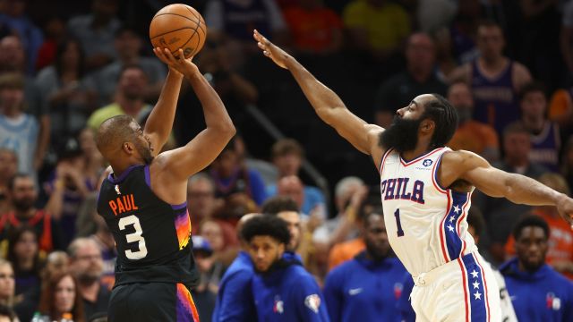 Phoenix Suns guard Chris Paul and Philadelphia 76ers guard James Harden