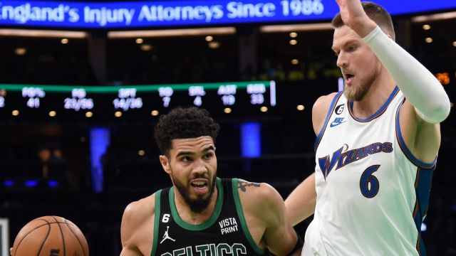 Boston Celtics forward Jayson Tatum and Washington Wizards center Kristaps Porzingis