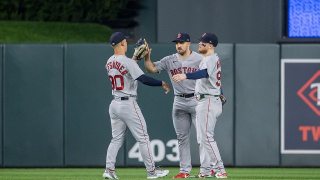 Boston Red Sox outfielders Alex Verdugo, Adam Duvall, Rob Refsnyder