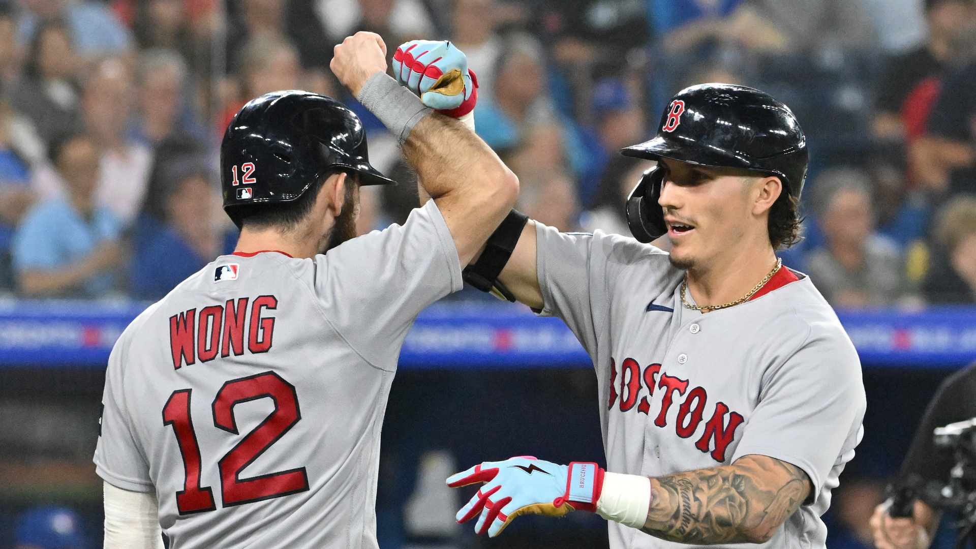 Boston Red Sox players, from left to right, Jarren Duran, Kike