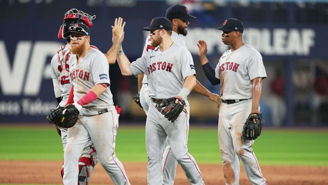 Boston Red Sox relief pitcher Kenley Jansen and third baseman Rafael Devers