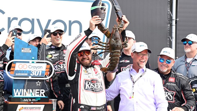 NASCAR driver Martin Truex Jr. and his Lobster celebrate winning the Crayon 301