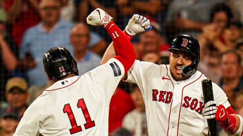 Boston Red Sox third baseman Rafael Devers and outfielder Adam Duvall