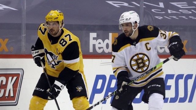 Pittsburgh Penguins center Sidney Crosby and retired Boston Bruins center Patrice Bergeron