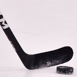 St. Louis Blues players hockey stick and puck