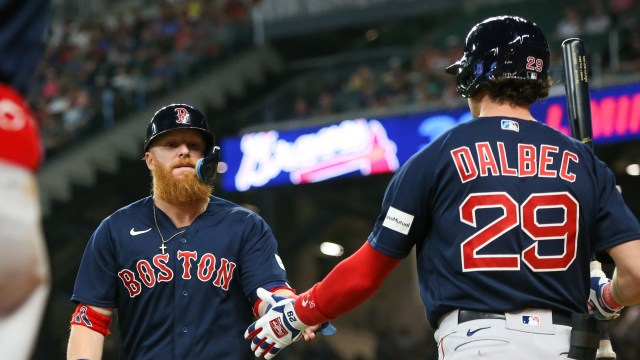 Boston Red Sox infielders Justin Turner and Bobby Dalbec