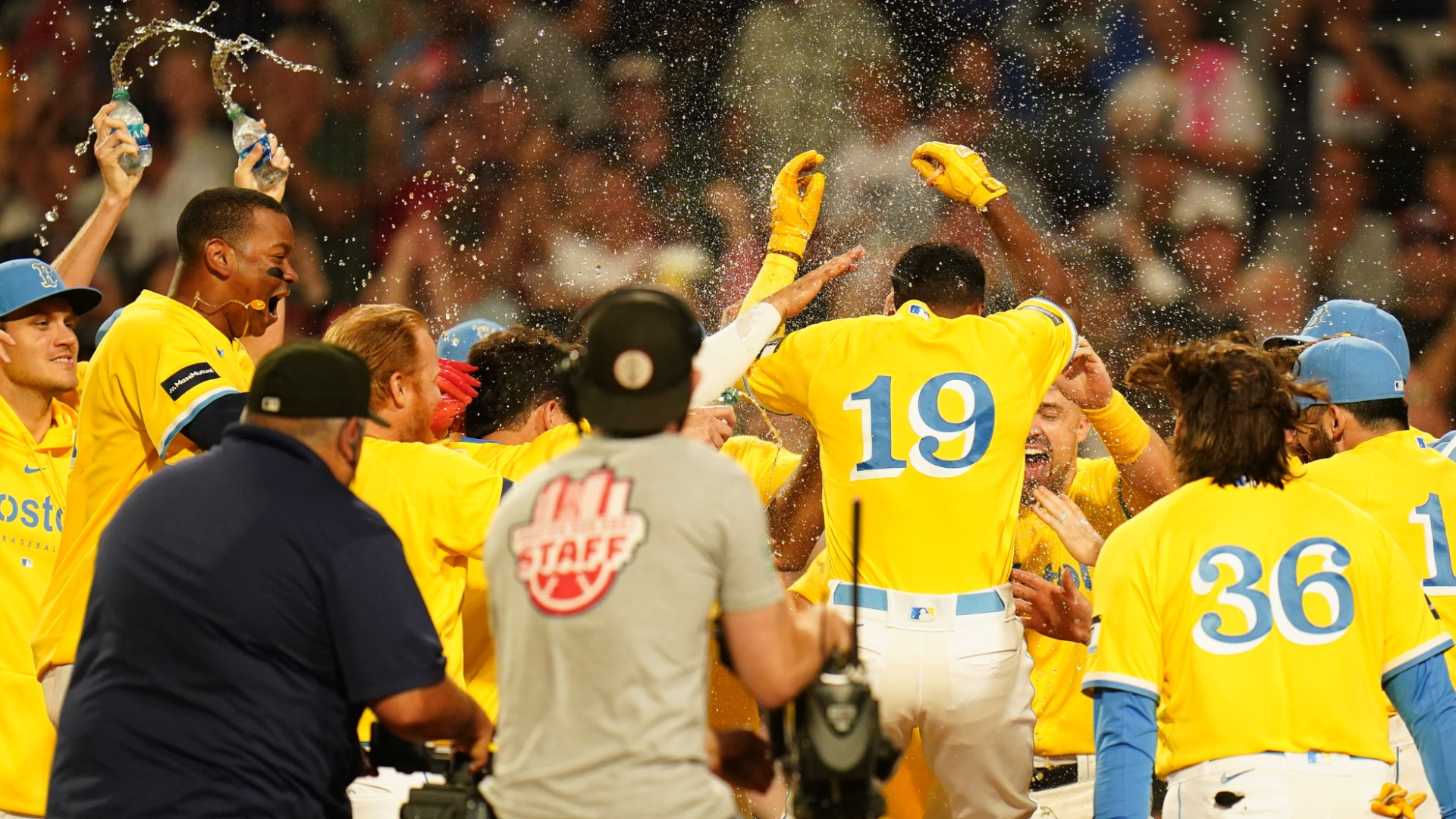 Boston Red Sox SS Pablos Reyes celebrates his walk-off grand slam