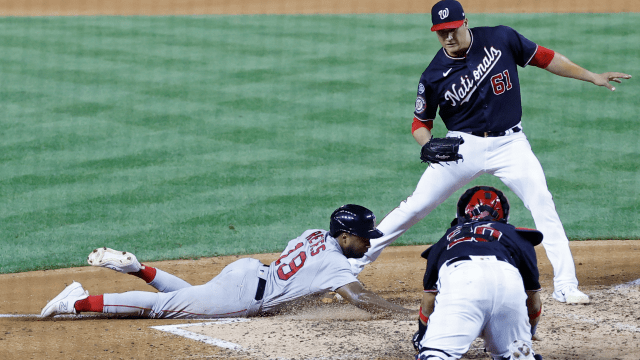 Boston Red Sox infielder Pablo Reyes and Washington Nationals pitcher Robert Garcia