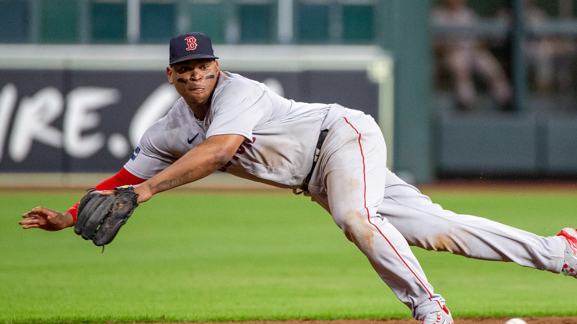 Rafael Devers of the Boston Red Sox spits against the Philadelphia