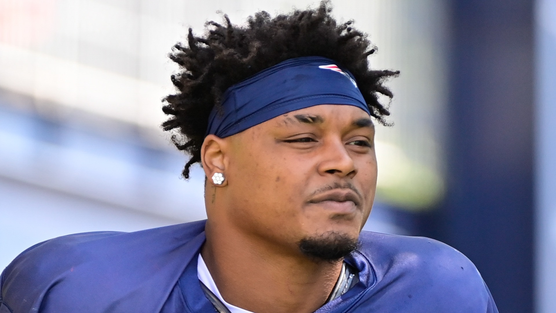 New England Patriots defensive end DaMarcus Mitchell warms up