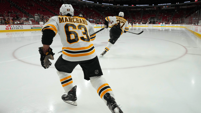 Boston Bruins forward Brad Marchand and former Boston Bruins center Patrice Bergeron