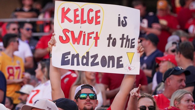 Sign celebrating singer Taylor Swift and Kansas City Chiefs tight end Travis Kelce