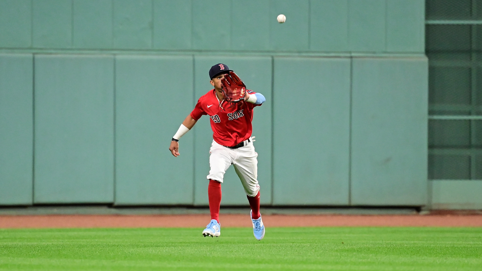 Bobby Dalbec of the Boston Red Sox warms up as he wears the Nike