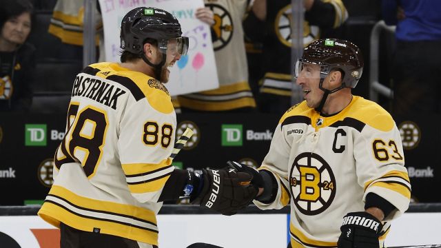 Boston Bruins wings David Pastrnak and Brad Marchand