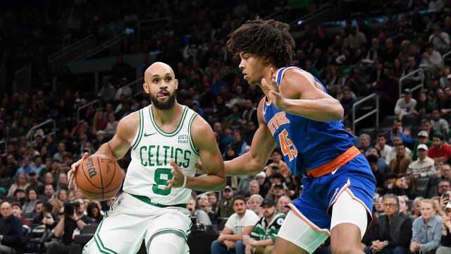 Boston Celtics guard Derrick White and New York Knicks center Jericho Sims