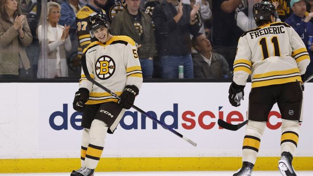 Boston Bruins forwards Matthew Poitras and Trent Frederic