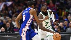 Boston Celtics guard Jaylen Brown and Philadelphia 76ers guard De'Anthony Melton