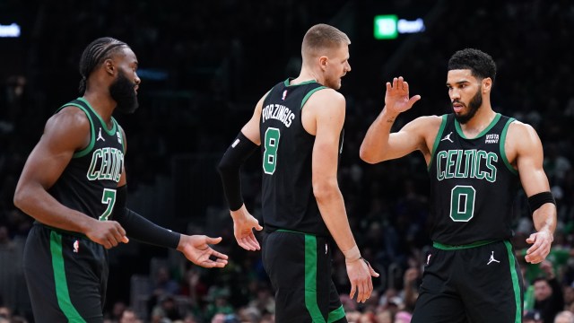 Boston Celtics teammates Jaylen Brown, Kristaps Porzingis and Jayson Tatum