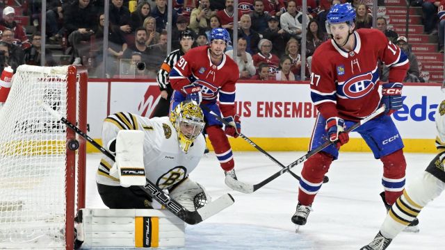 Boston Bruins goalie Jeremy Swayman and Montreal Canadiens forward Josh Anderson