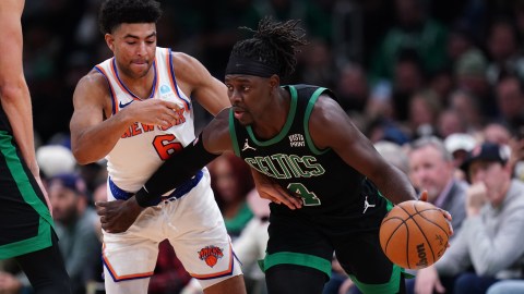 Boston Celtics guard Jrue Holiday and New York Knicks guard Quentin Grimes