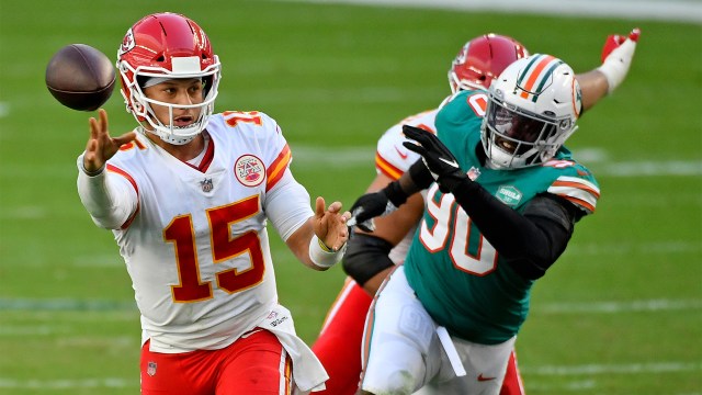 Kansas City Chiefs quarterback Patrick Mahomes and a Miami Dolphins pass rusher