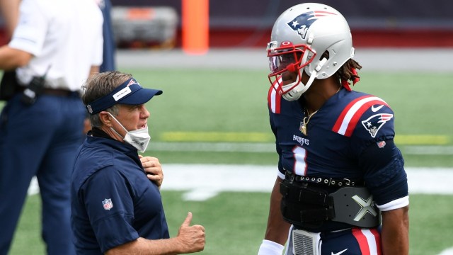New England Patriots head coach Bill Belichick and free agent quarterback Cam Newton