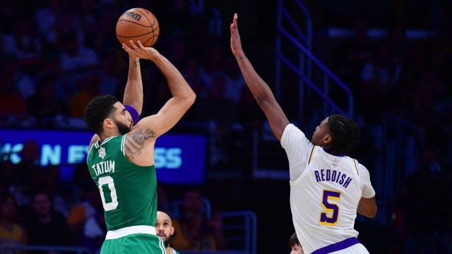 Boston Celtics forward Jayson Tatum and Los Angeles Lakers guard Cam Reddish