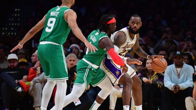 Boston Celtics guard Jrue Holiday and Los Angeles Lakers forward LeBron James