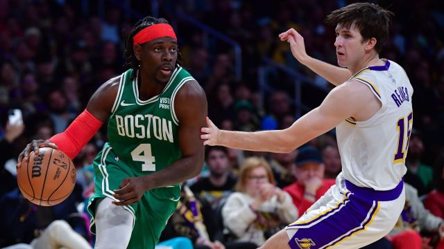 Boston Celtics guard Jrue Holiday and Los Angeles Lakers guard Austin Reaves